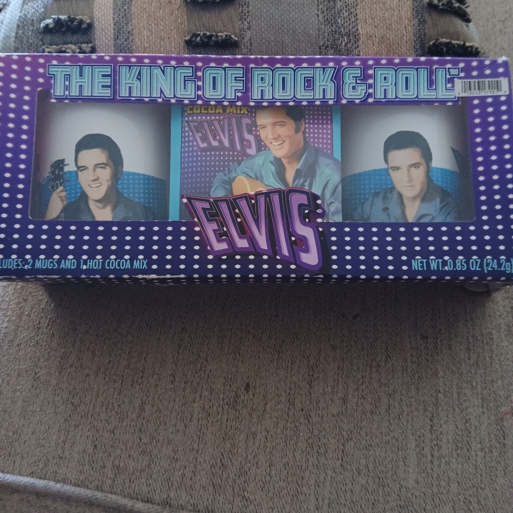 The king of rock & roll Elvis Presley. 2 mugs & a packet of hot cocoa mix.